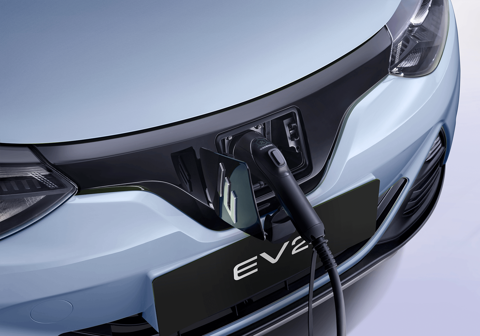 JMEV EV2 celeste vista cenital en entrada de casa